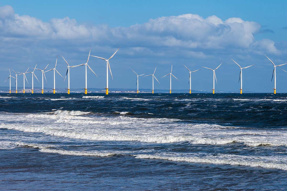 A wind turbine farm off the coast of Yorkshire, UK