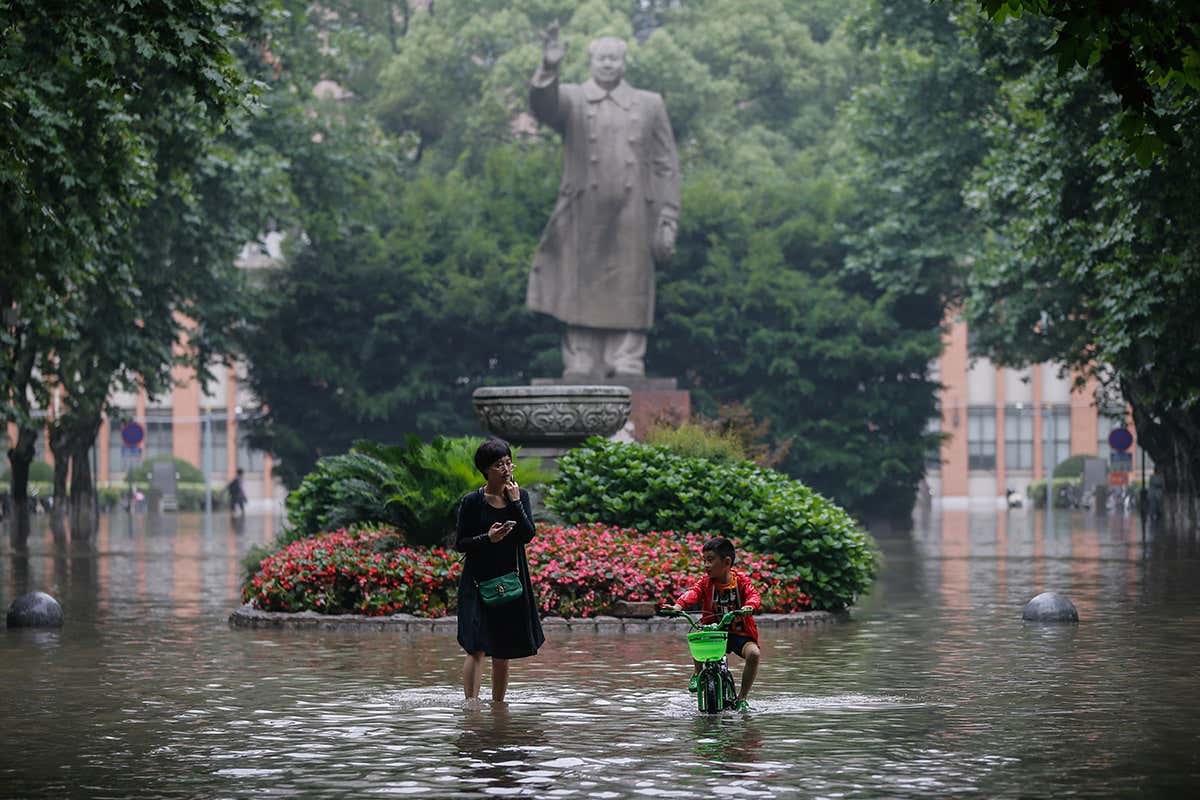people in floodwater