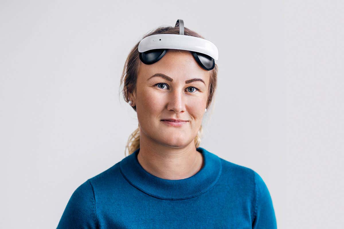 person wearing brain-zapping headset