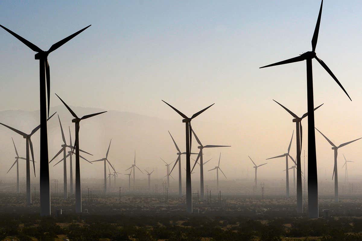 Wind turbines generate electricity at the San Gorgonio Pass Wind Farm near Palm Springs, California, as a dust storm blows through the area. Located in the windy gap between Southern California's two highest mountains, the facility is one of three major wind farms in California.
