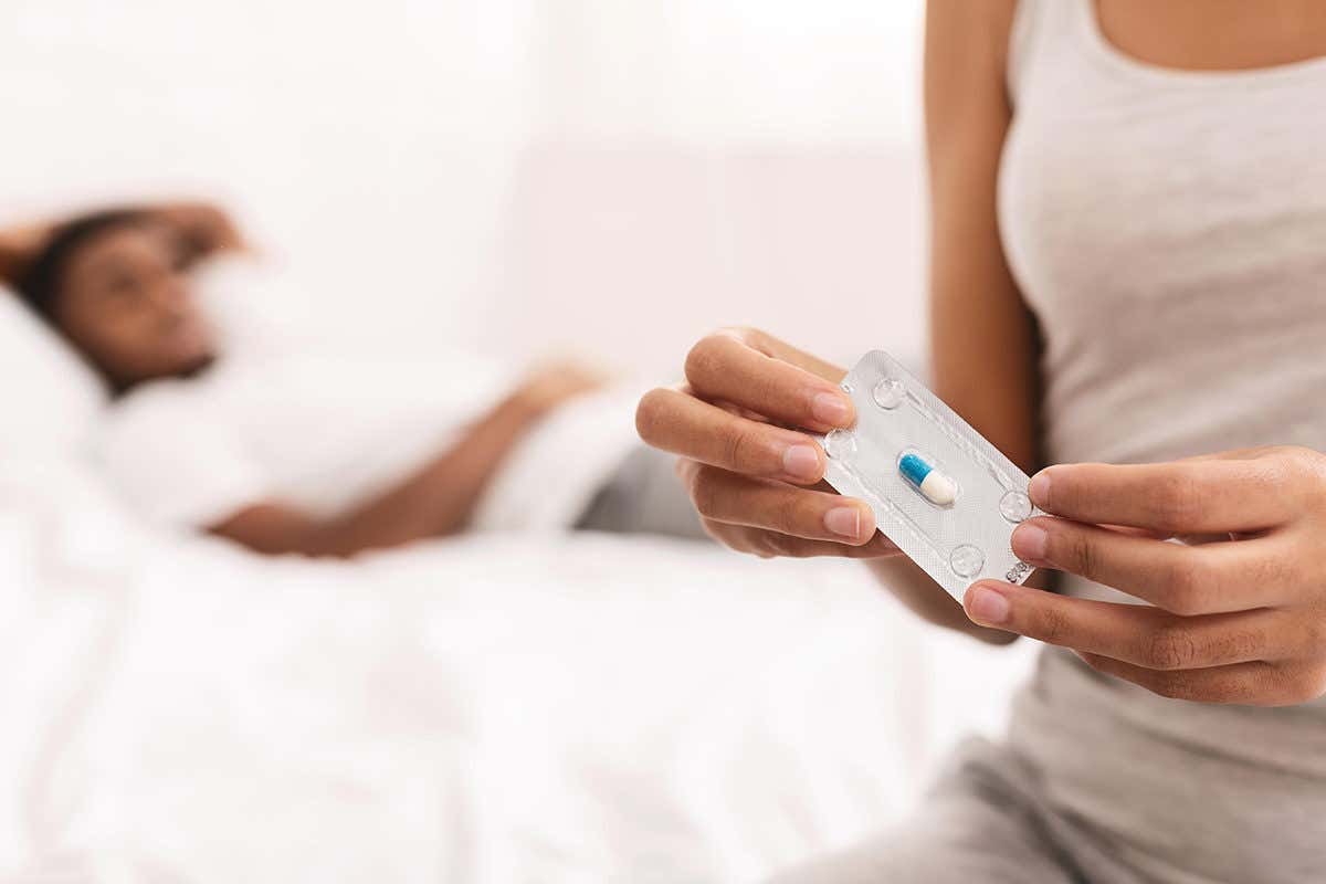 A woman taking oral emergency contraceptive