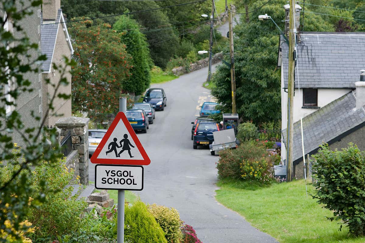 BDJ269 Welsh language school sign in the village of Croesor in the Snowdonia National Park