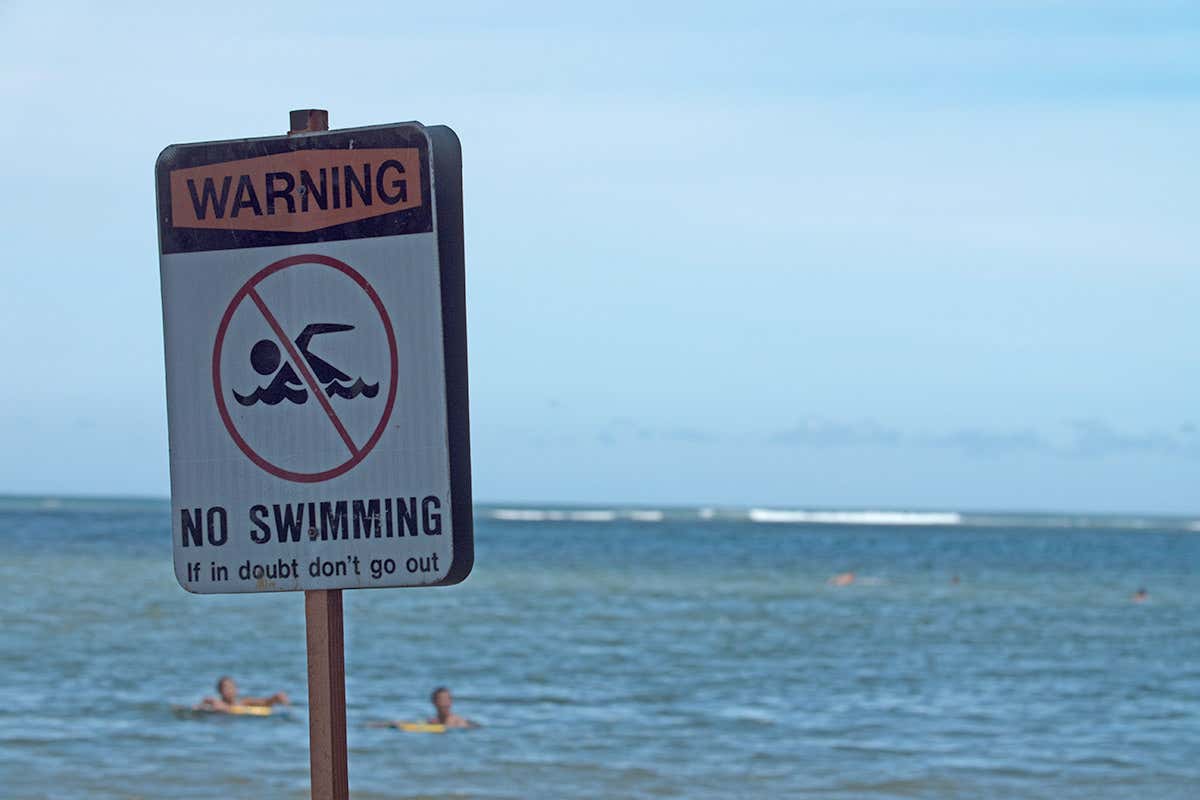 no swimming warning sign