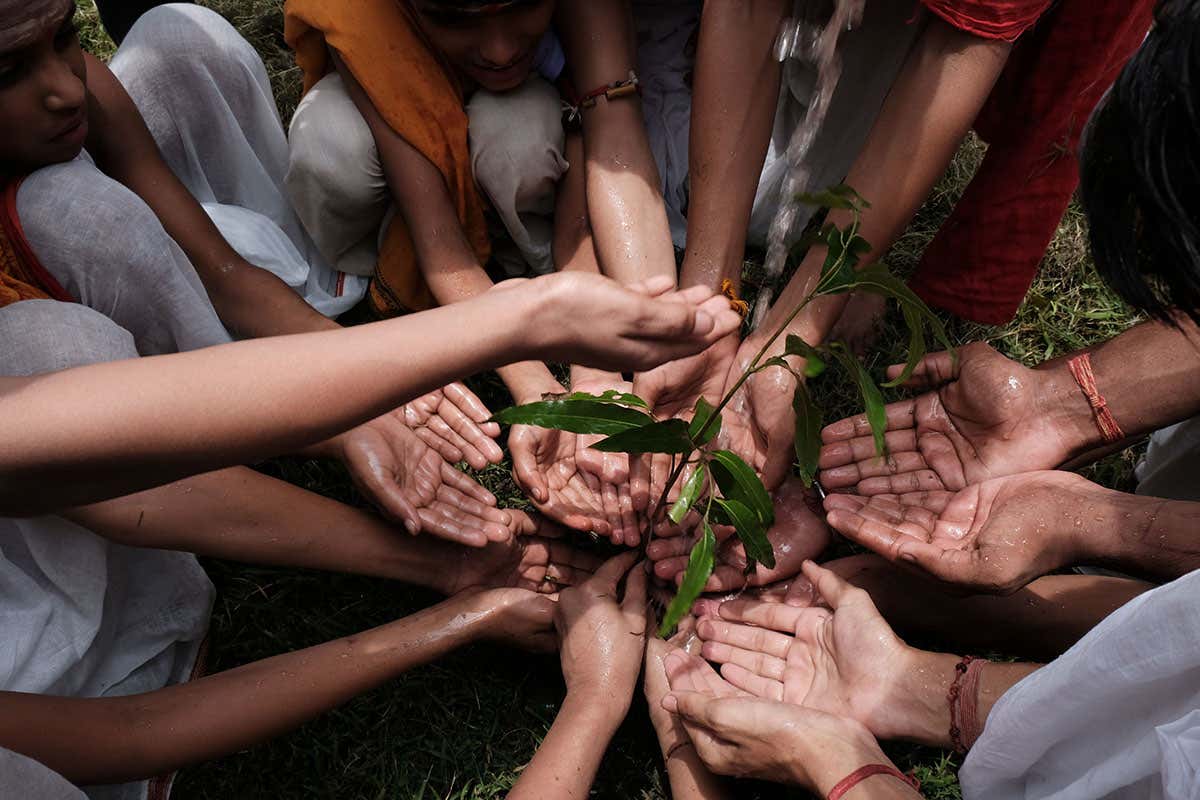 Optimism can avert climate disaster, say duo who brokered Paris deal