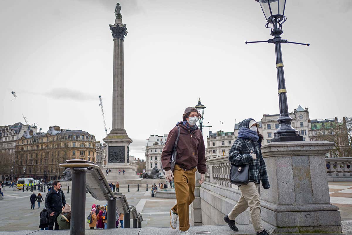People in London wearing surgical masks