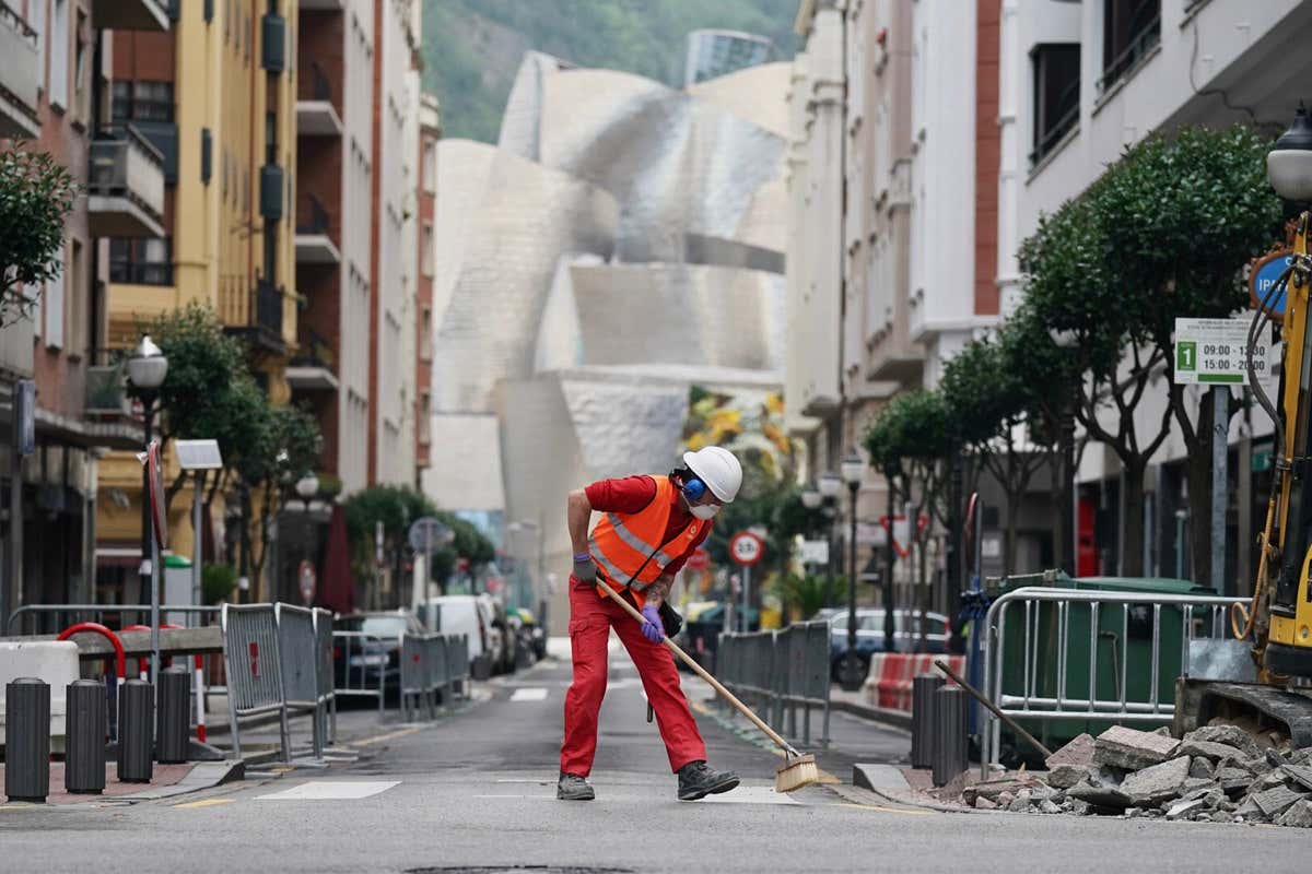 a worker on the streets of bilbao