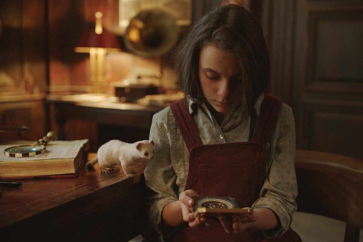 Lyra with her daemon Pan from the BBC version of His Dark Materials
