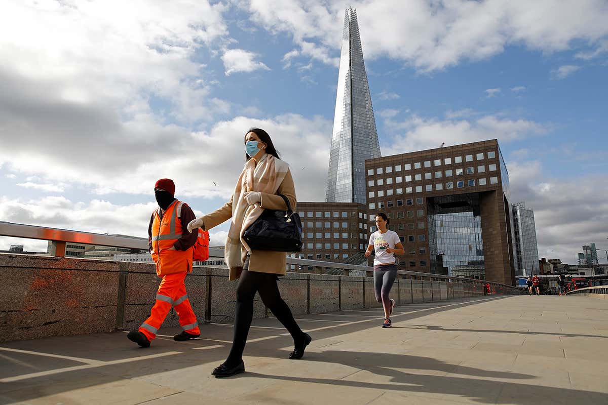 commuters on a bridge