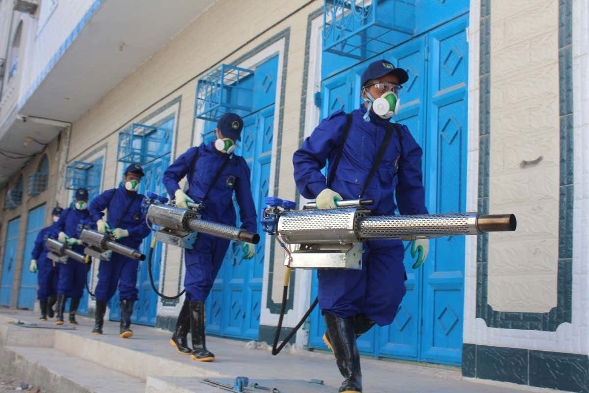 Sanitary workers prepare for fumigation in Yemen to prevent spread of malaria