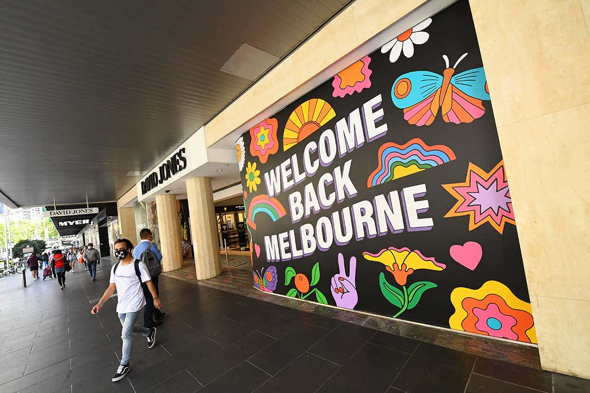 A welcome back sign outside a department store in Melbourne