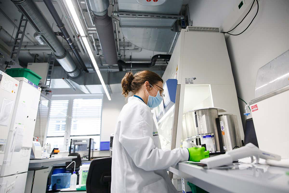 A laboratory technician works in a laboratory at BioNTech in Mainz, Germany