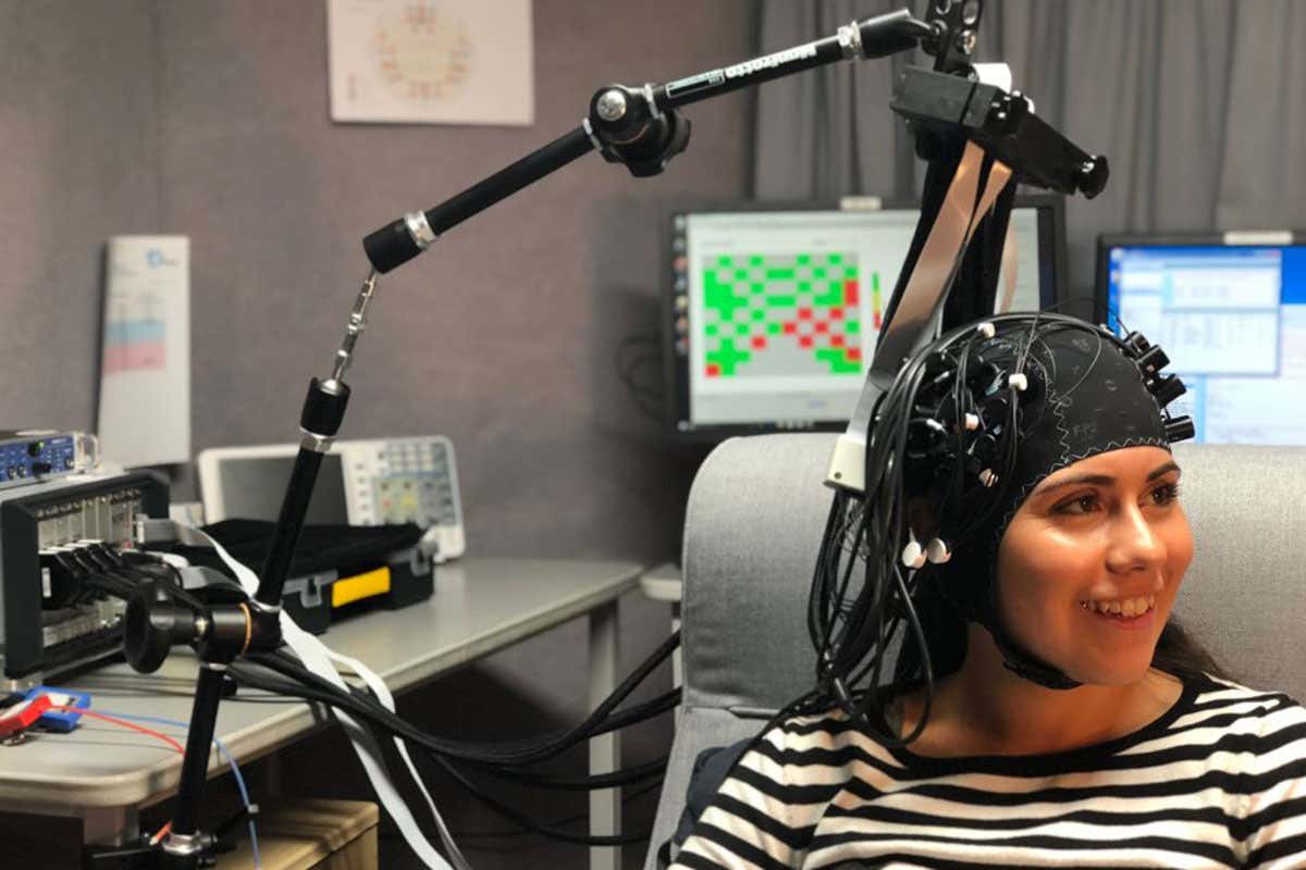 Woman and fNIRS machine