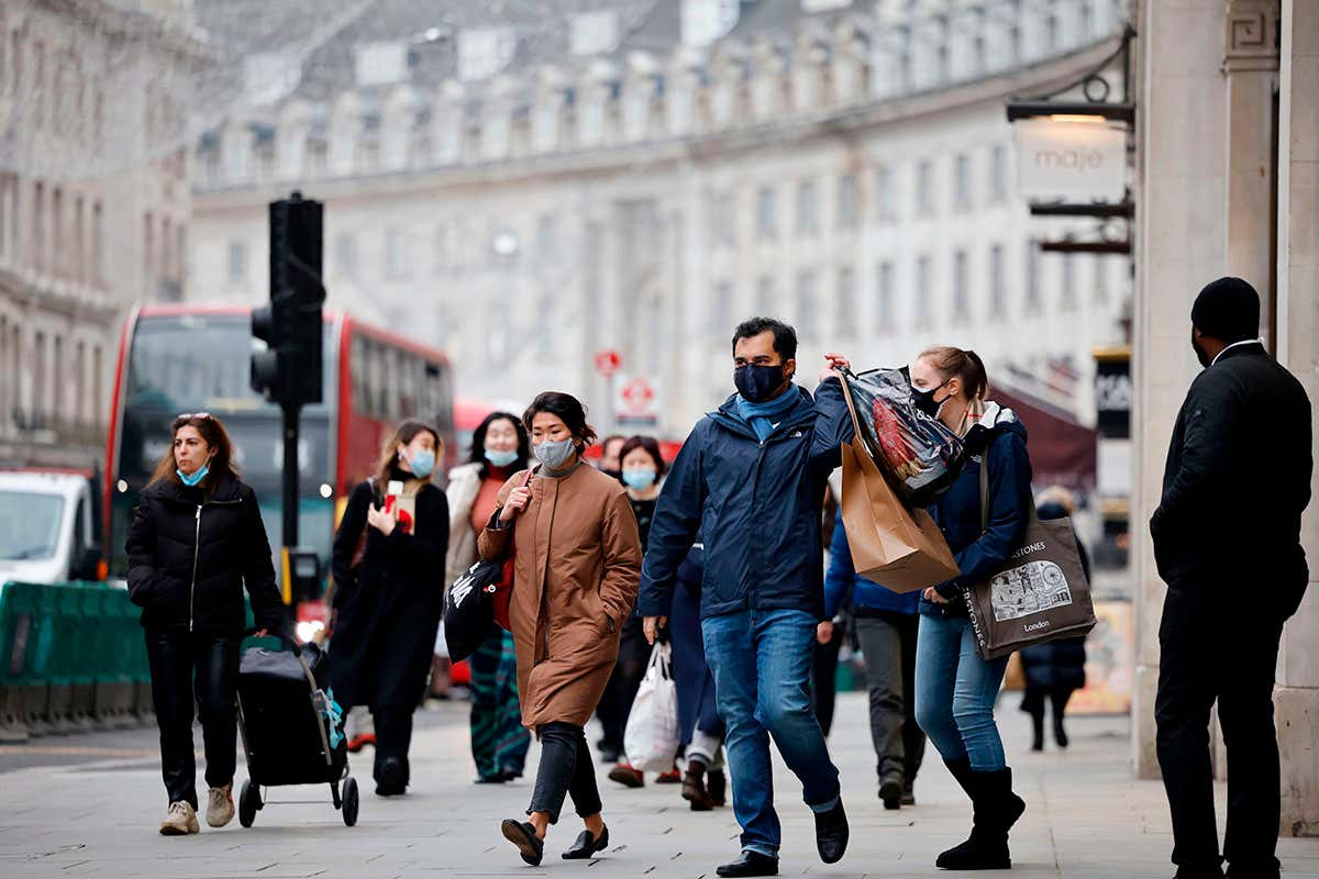 Shoppers in London’s main high-street shopping district on Regent street