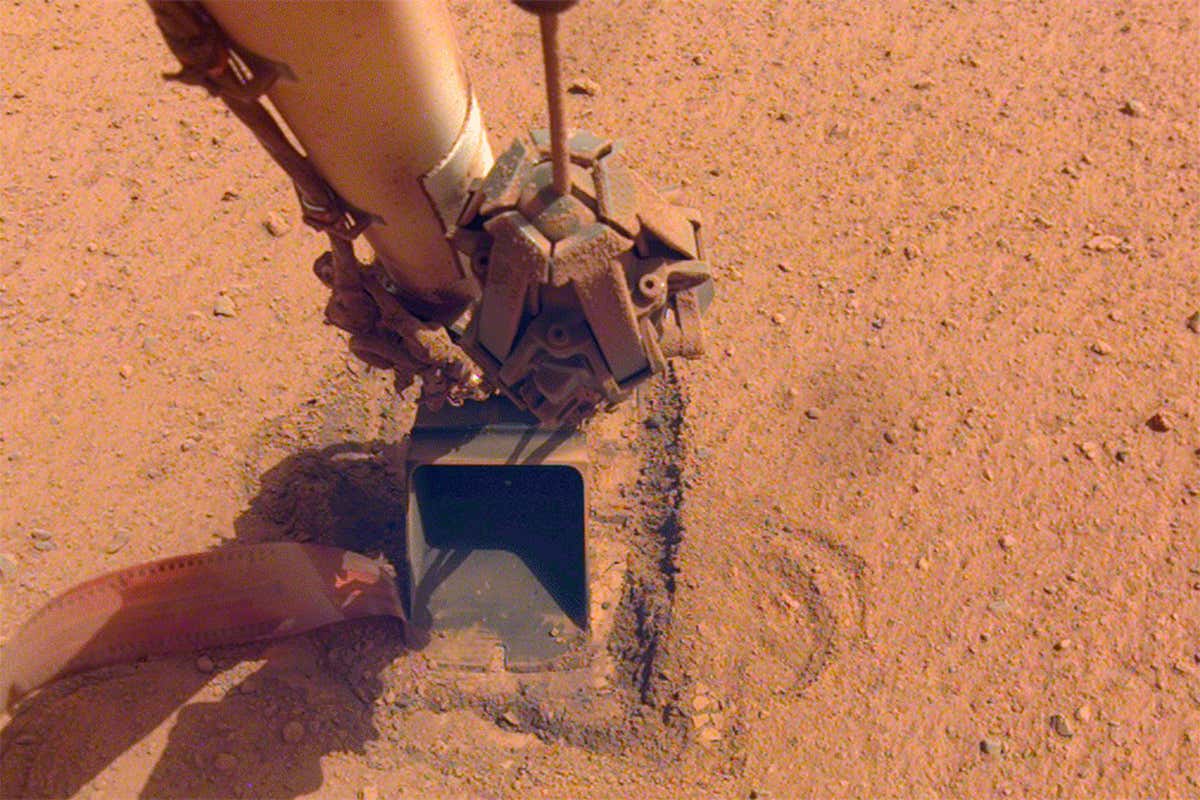 The InSight mole team tried to save the mole by pressing on it with the lander's arm scoop, but ultimately couldn't get it to dig down into Mars