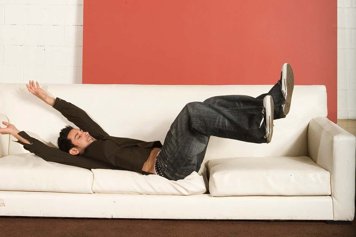 Do I create gravitational waves when I crash onto the sofa?