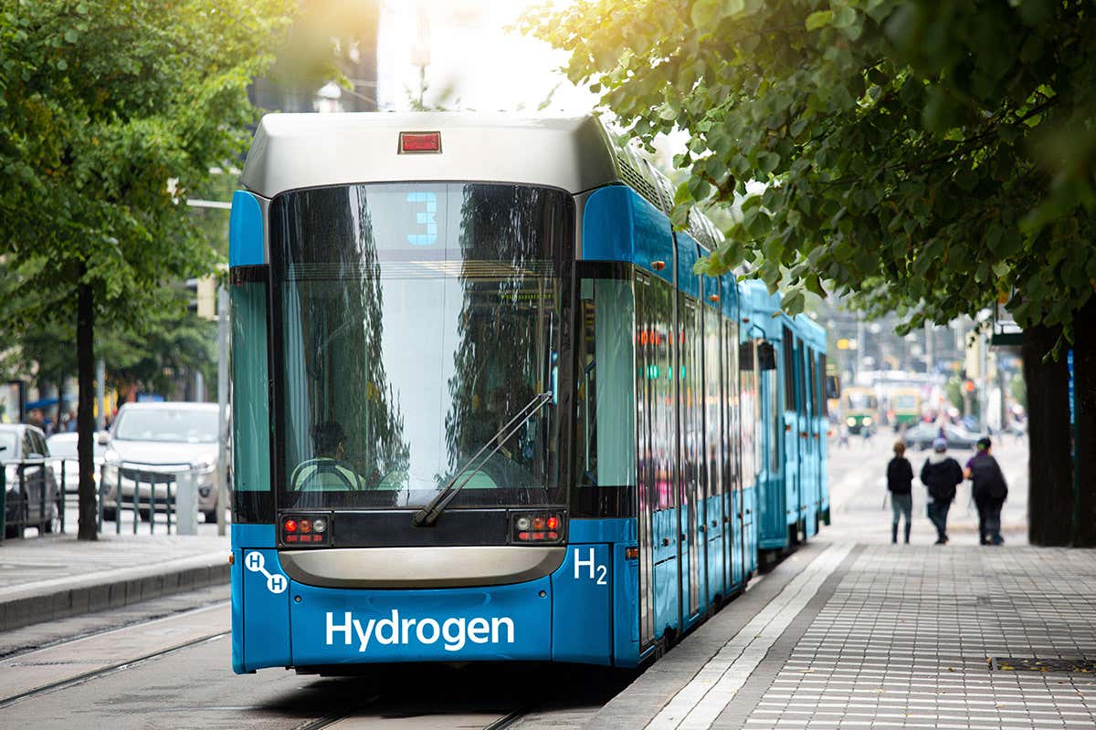 A hydrogen fuel cell tram on a city street