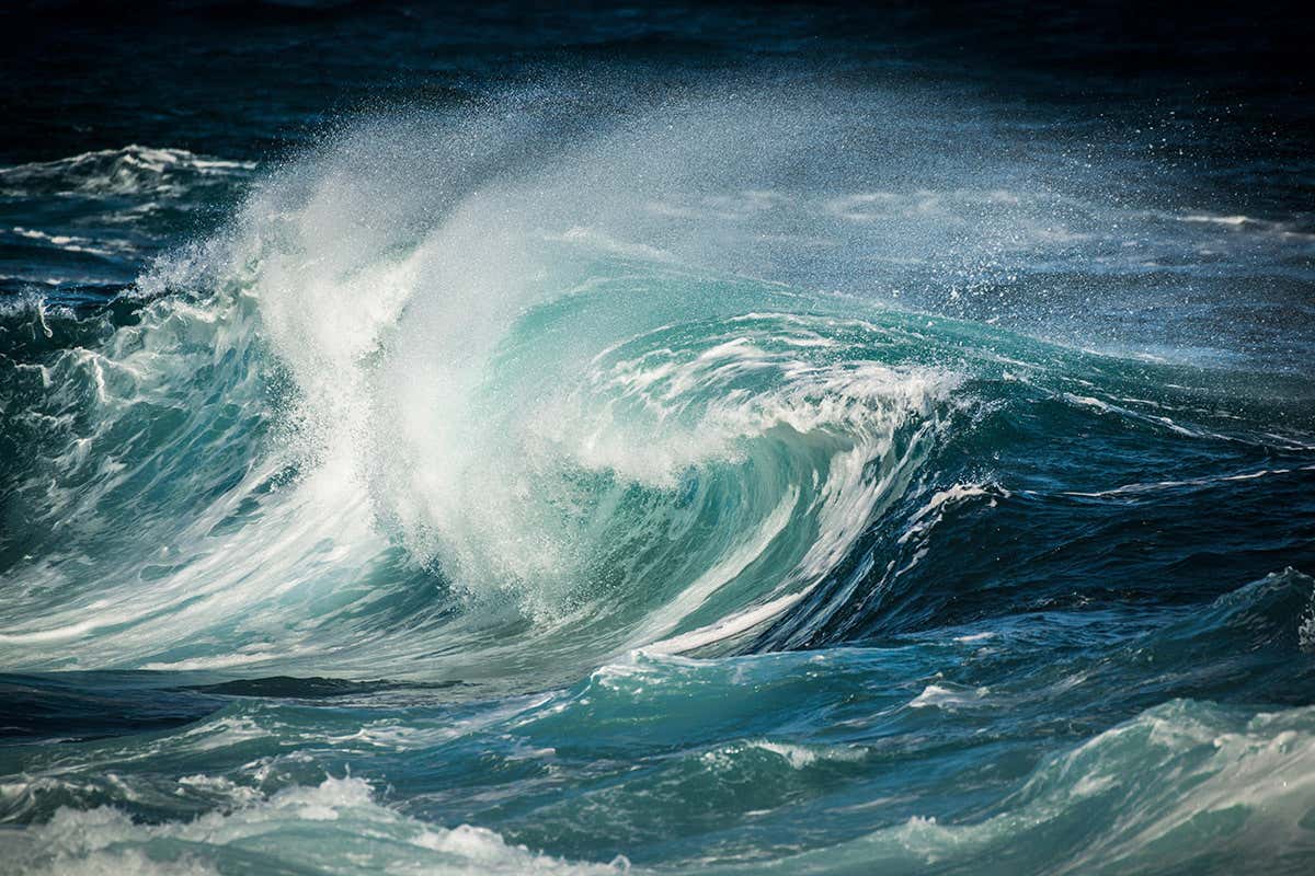 What causes waves in the ocean?