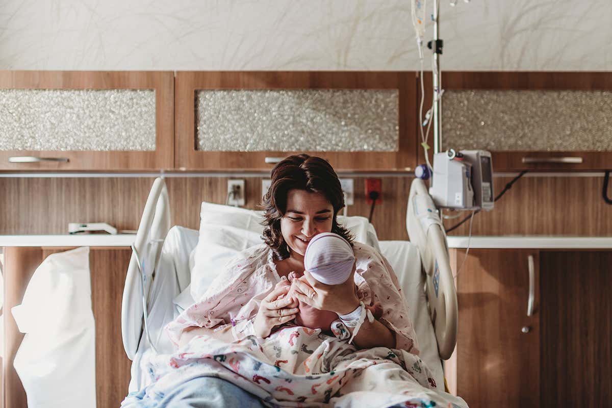 A mother holding her child