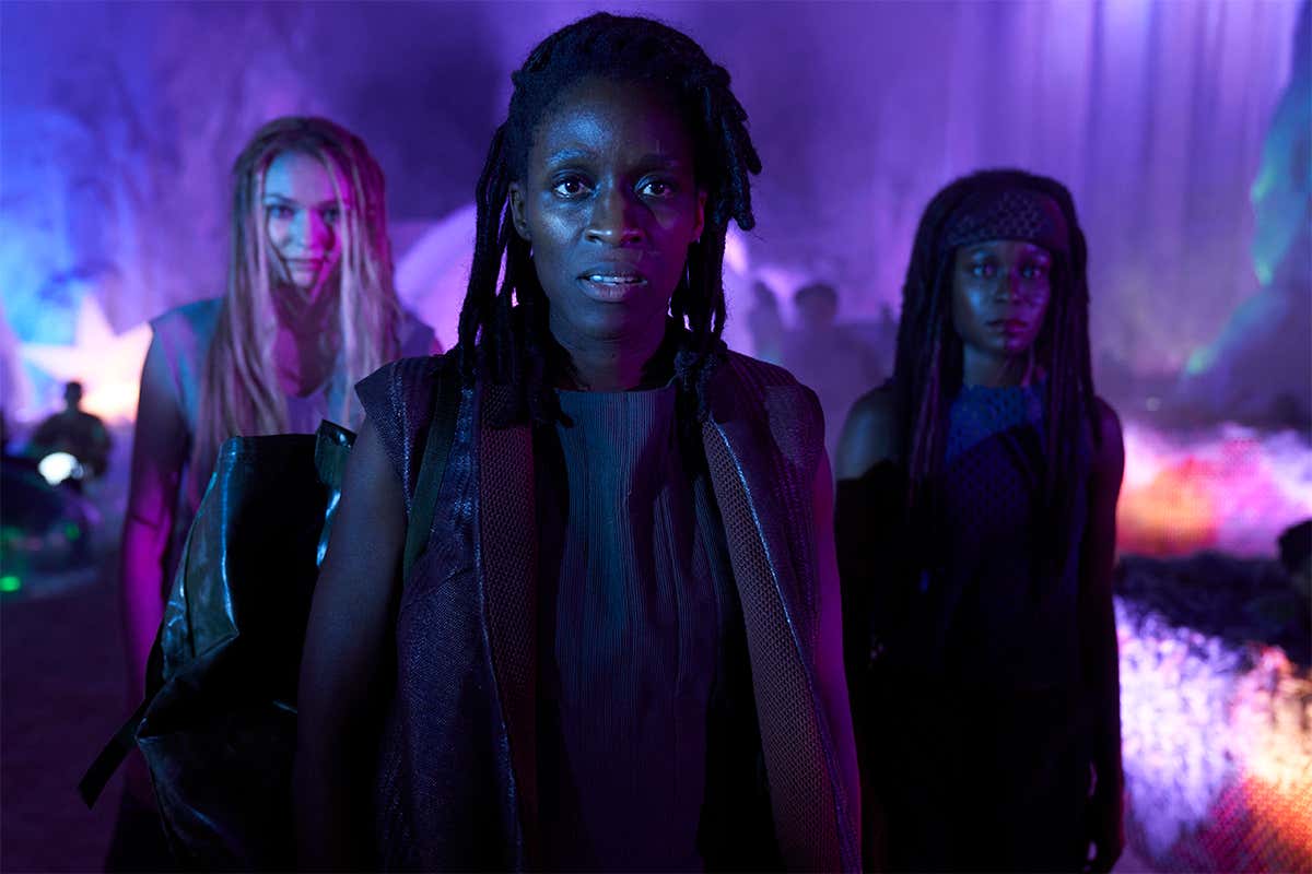 Tula (Sharon Duncan-Brewster) with Cady (Eleanor Tomlinson, left) and Genevieve (Diany Samba-Bandza, right) in Intergalactic