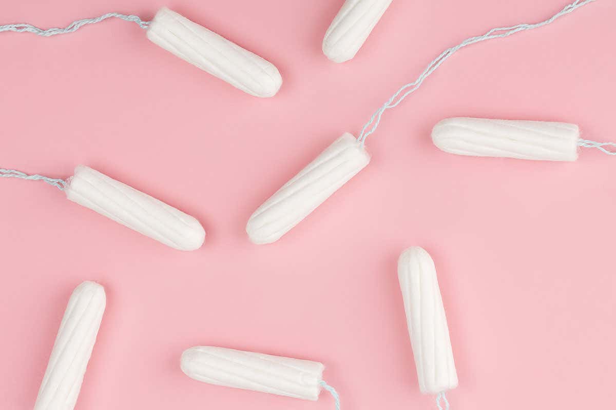 Tampons on pink background