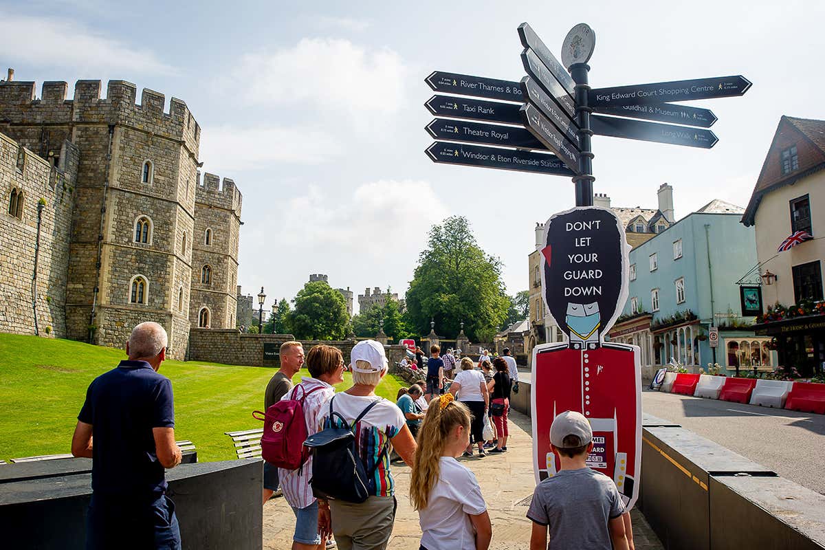 People gather at Windsor castle in Berkshire, UK