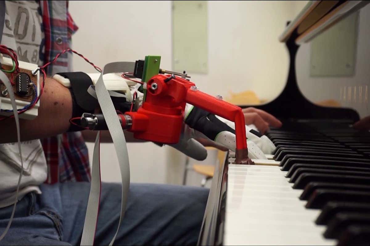 pianist with robotic thumb