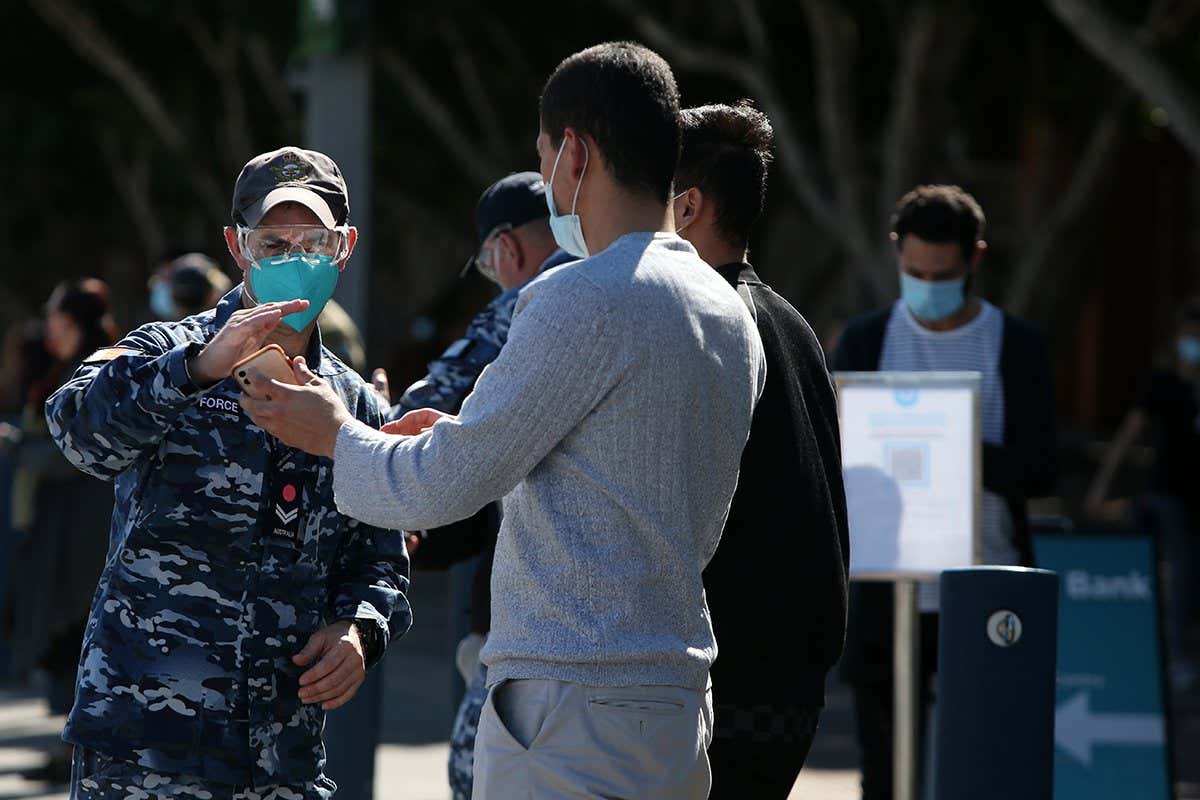 The Australian Defence Force assisting people at the Qudos Bank Arena NSW Health Vaccination Centre