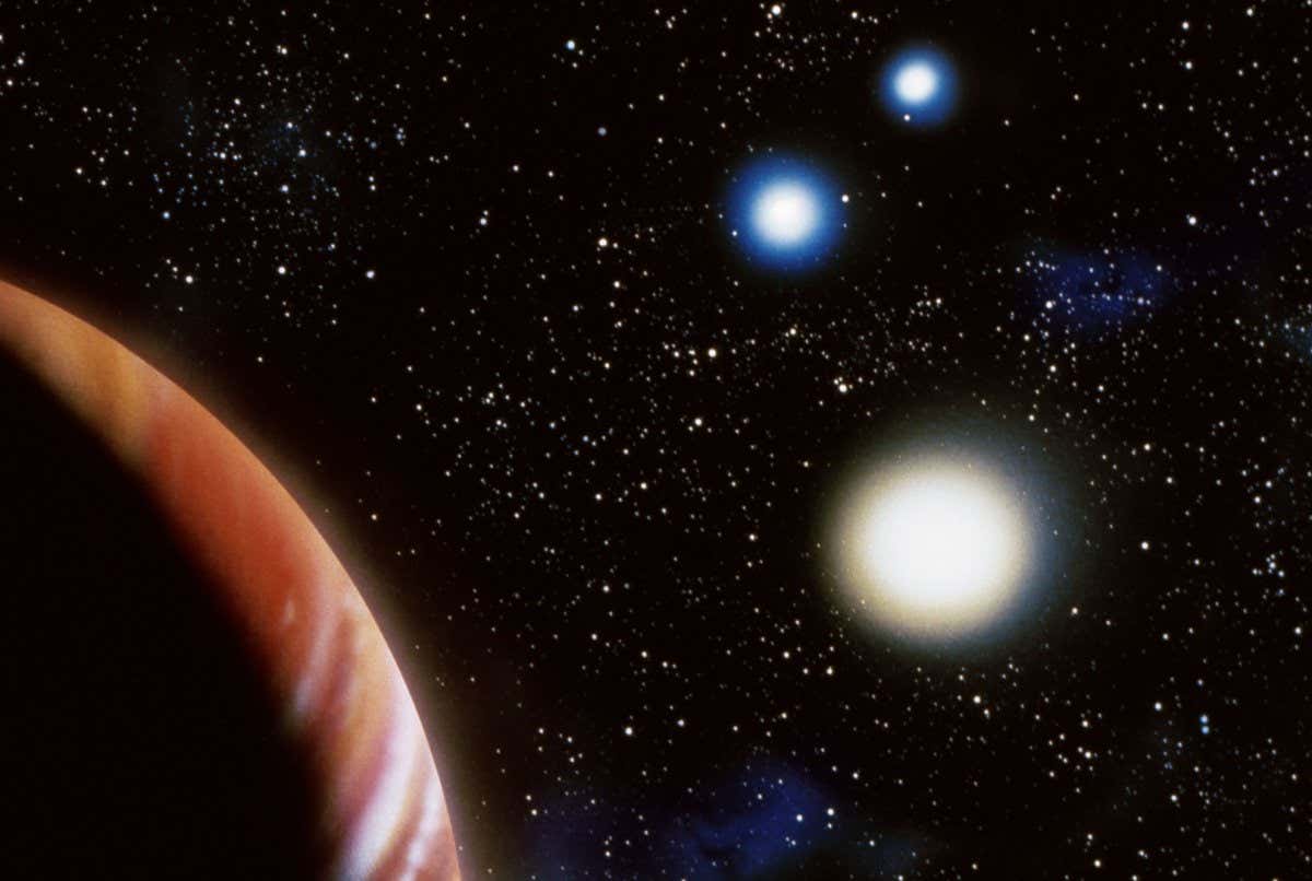 AArtist's impression of a planet near three stars