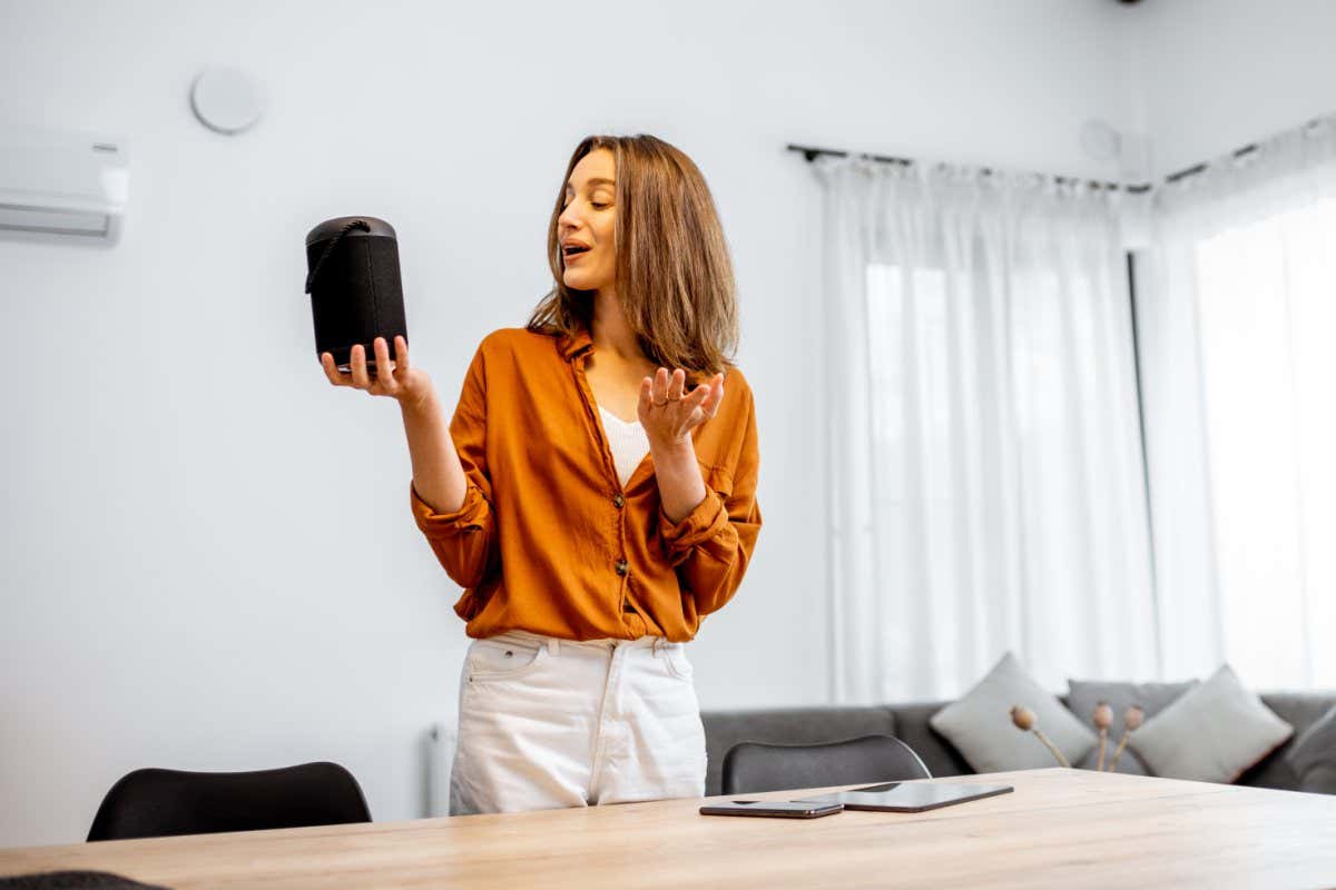 A woman using a voice assistant