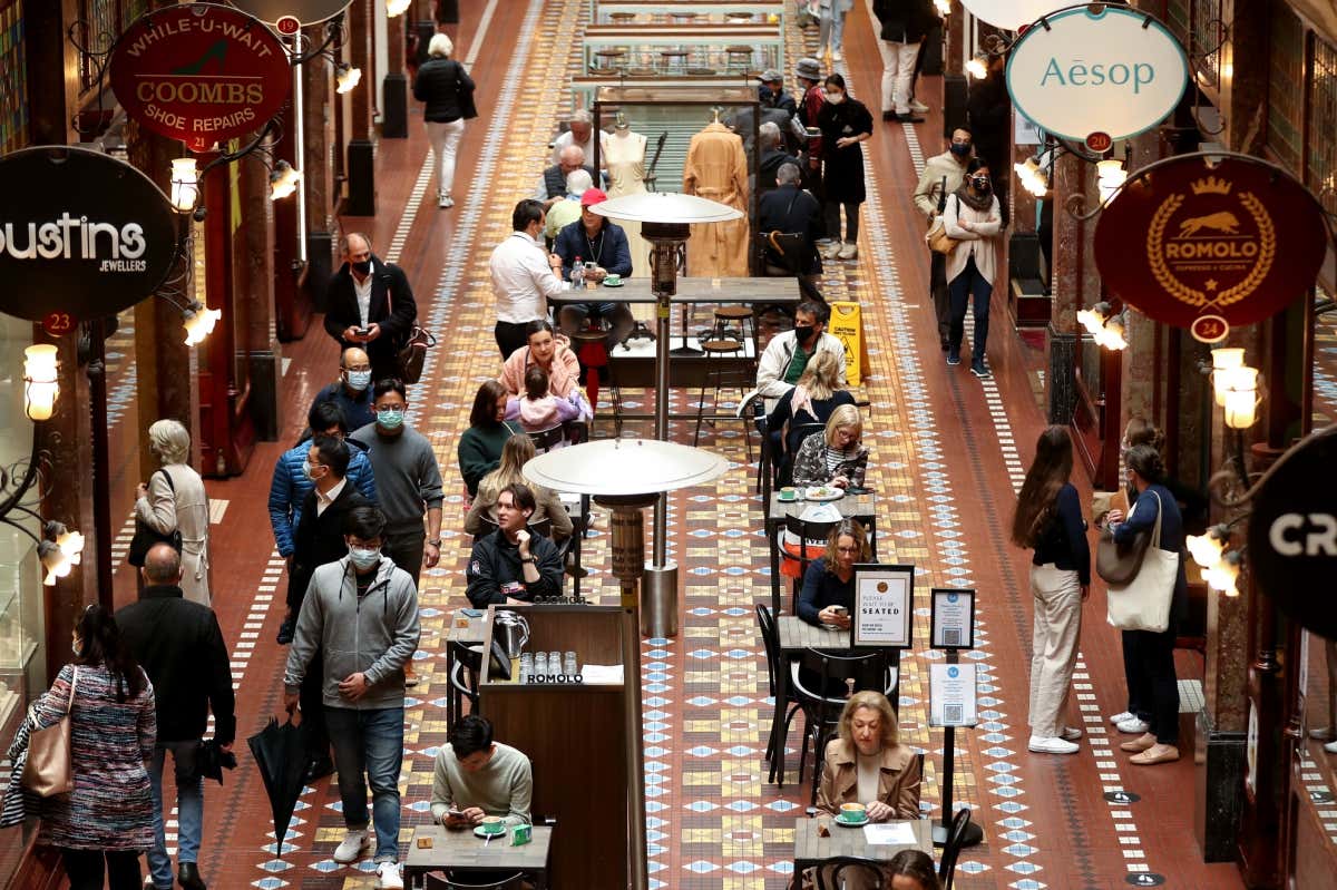 Diners at a cafe in Sydney, Australia, today.