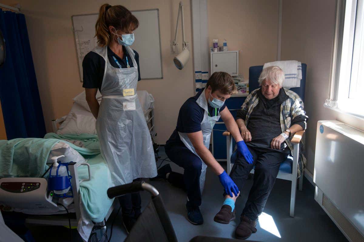 Man receives physiotherapy