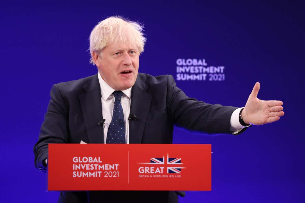 Boris Johnson, U.K. prime minister, delivers the opening remarks during the Global Investment Summit (GIS) 2021 at the Science Museum in London, U.K., on Tuesday, Oct. 19, 2021. Johnson is hosting the summit, where as many as 200 CEOs and investors are expected to gather. Photographer: Hollie Adams/Bloomberg via Getty Images