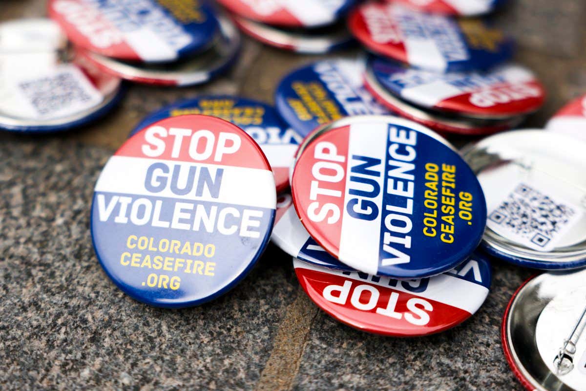 Buttons that say STOP GUN VIOLENCE