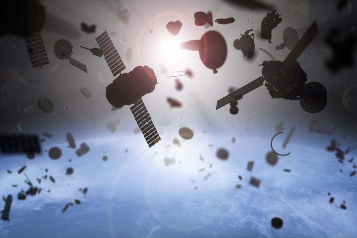 Space junk concept. Toxic garbage in the space over Earth