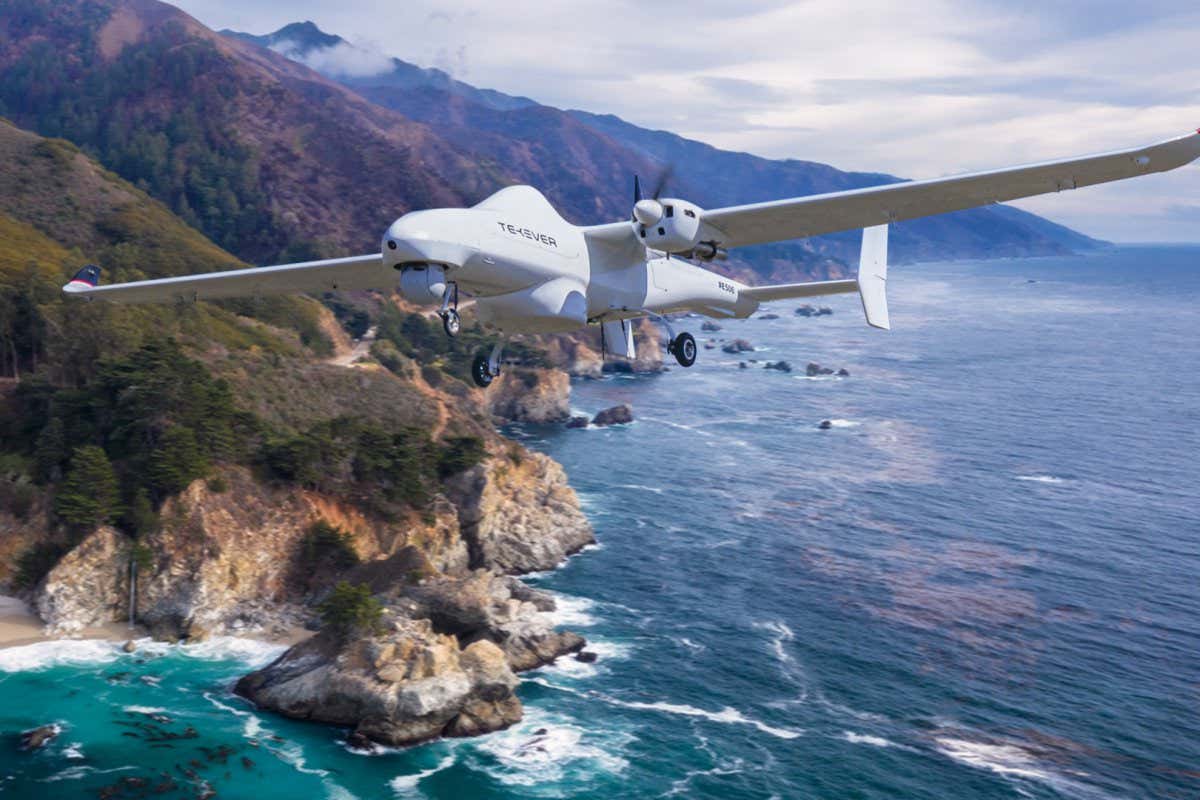 drone flying over a coastline