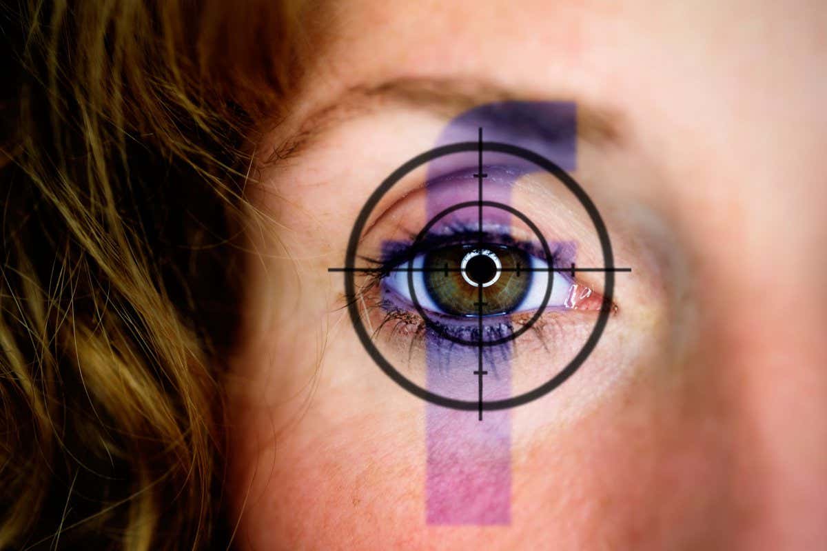 Woman's eye with cross hair and Facebook logo