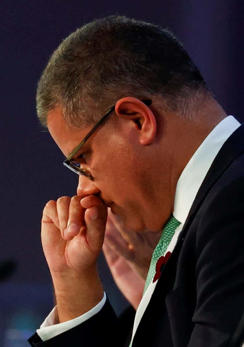 COP26 President Alok Sharma reacts during the UN Climate Change Conference (COP26) in Glasgow, Scotland, Britain November 13, 2021. REUTERS/Phil Noble