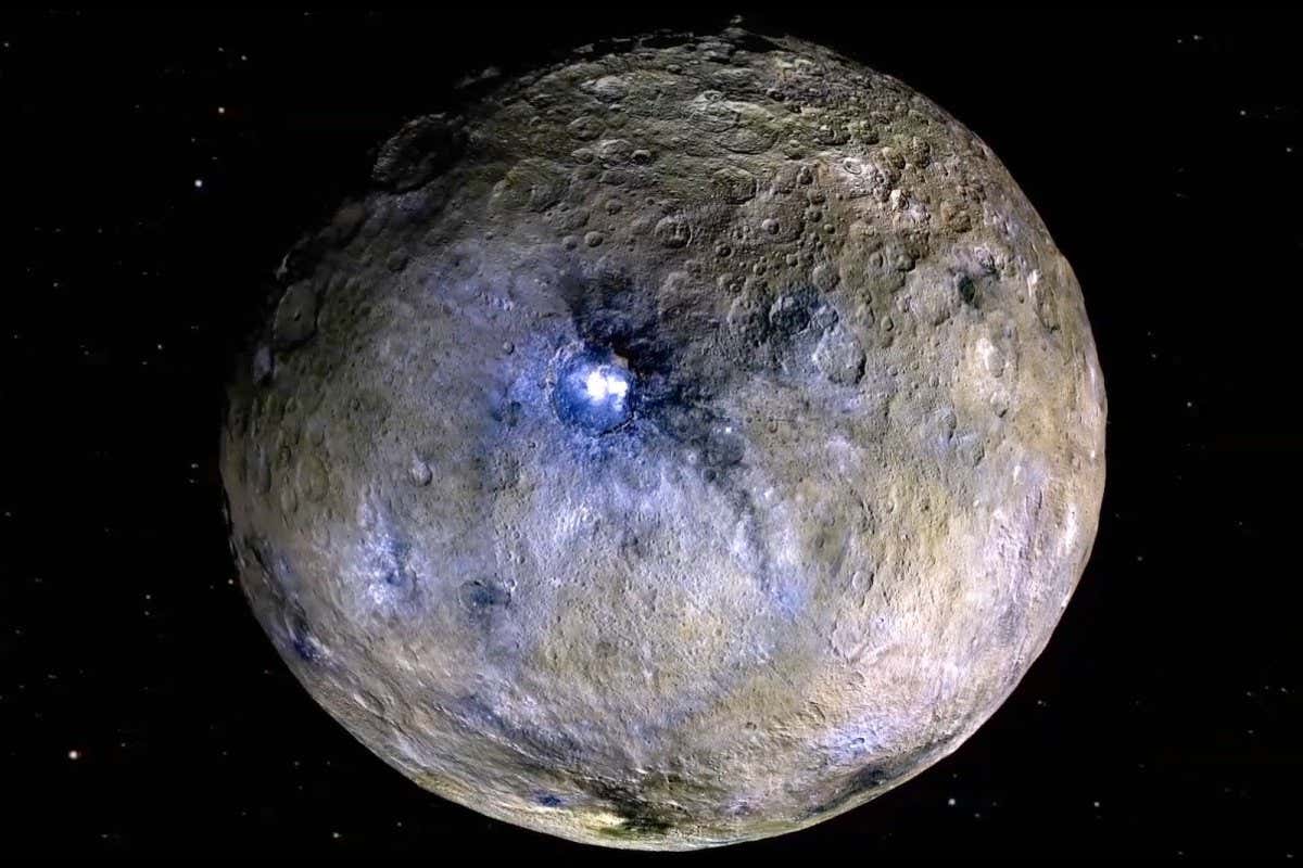 Dwarf planet Ceres is shown in these false-color renderings, which highlight differences in surface materials.