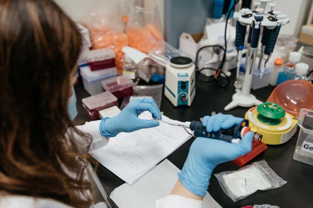 A technician prepares a sample