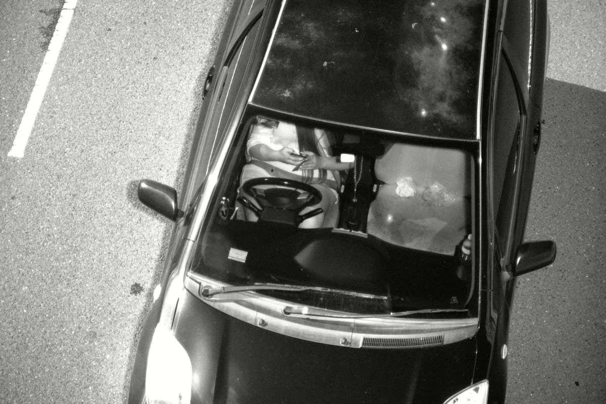 Mandatory Credit: Photo by Uncredited/AP/Shutterstock (10421309a) This Jan. 12, 2019, photo captured by a Mobile Phone Detection Camera and released by Transport for NSW shows a driver using a mobile phone while driving in Australia. Australian state New South Wales is attempting to persuade the public to put down their smartphones while driving by rolling out cameras to prosecute distracted motorists. New South Wales Roads Minister Andrew Constance said, Australia's most populous state was the first jurisdiction in the world to use such technology to punish drivers distracted by social media, text messages or phone calls. The government intends to roll out 45 Mobile Phone Detection Cameras across the state by December, he said Australia Distracted Drivers - 23 Sep 2019