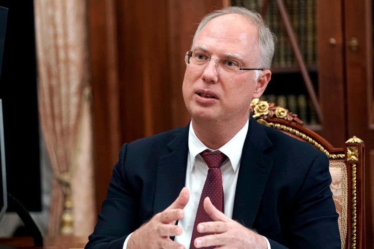 Mandatory Credit: Photo by Alexei Druzhinin/AP/Shutterstock (12536354a) Russian Direct Investment Fund CEO Kirill Dmitriev gestures while speaking to Russian President Vladimir Putin during their meeting in Moscow, Russia. Dmitriev said Russia plans to provide up to 300 million doses of its Sputnik vaccine to the U.N.-backed initiative, COVAX, once the vaccine is approved by the World Health Organization Virus Outbreak Russia, Moscow, Russian Federation - 01 Apr 2021