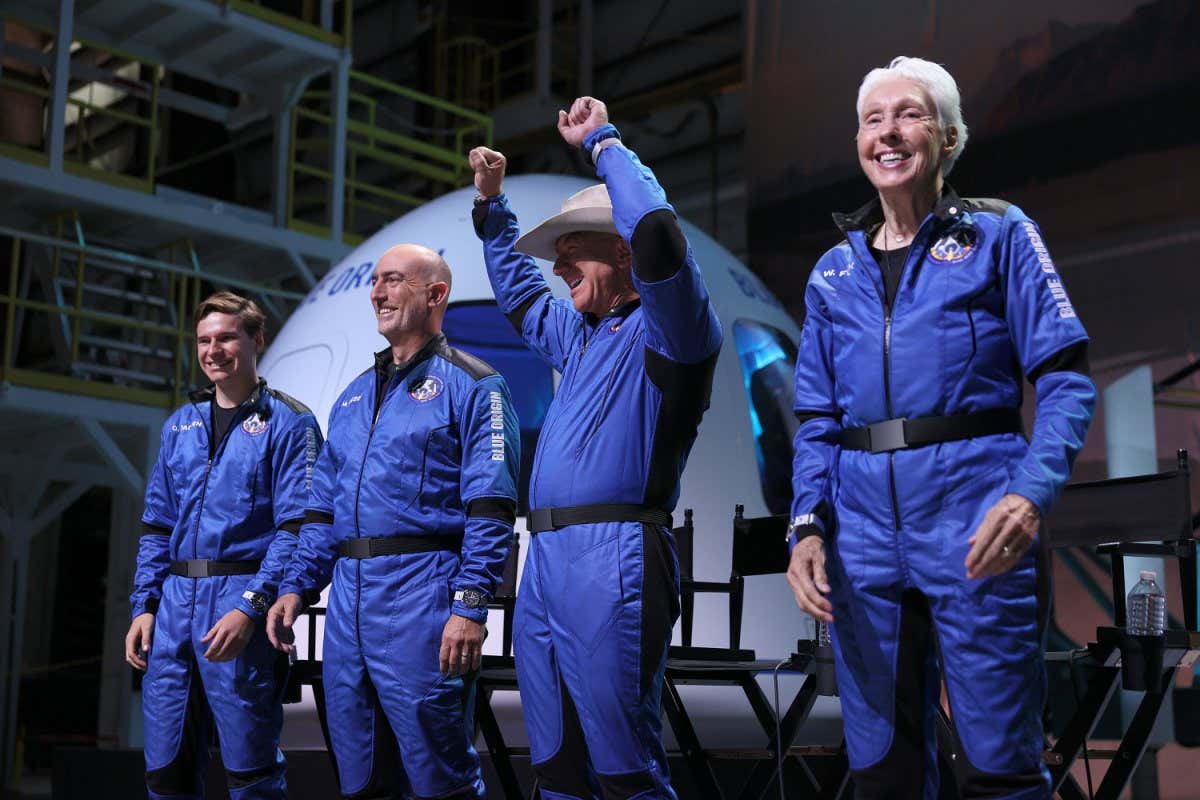 VAN HORN, TEXAS - JULY 20: Blue Origin???s New Shepard crew (L-R) Oliver Daemen, Mark Bezos, Jeff Bezos, and Wally Funk hold a press conference on July 20, 2021 in Van Horn, Texas. Mr. Bezos and the crew that flew with him were the first human spaceflight for the company. (Photo by Joe Raedle/Getty Images)