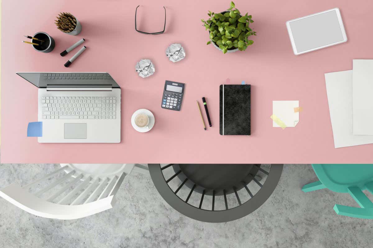 Top knolling view of an office desk. business template. teamwork scene, with laptop, papers, notebook, tablet etc. creative mess designer background. mock up template. render