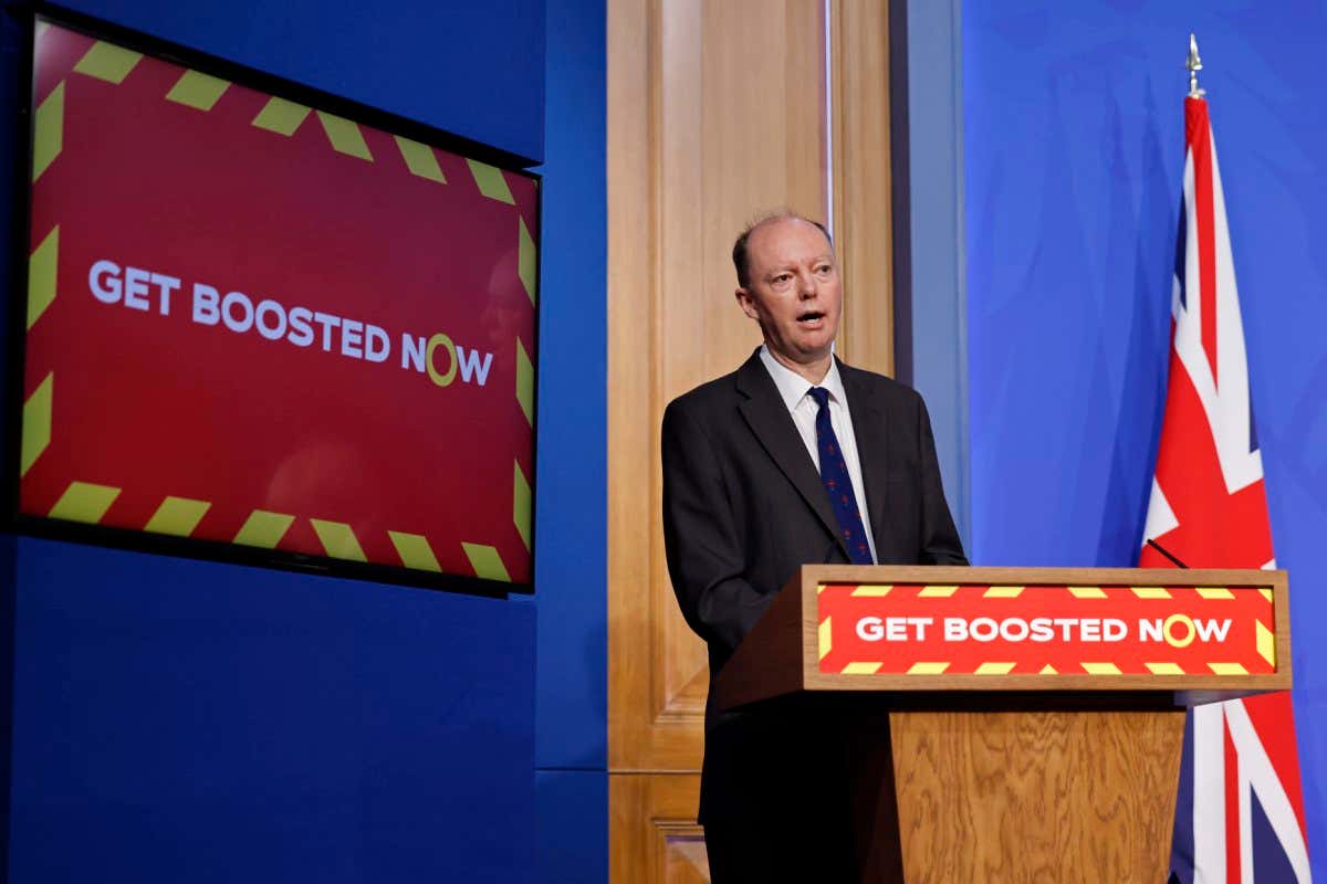 LONDON, ENGLAND - DECEMBER 15: Britain's Chief Medical Officer for England Chris Whitty addresses the nation during a Covid Update at Downing Street on December 15, 2021 in London, England. (Photo by Tolga Akmen - WPA Pool/Getty Images)