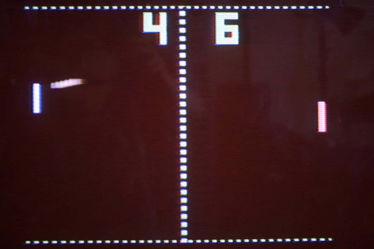 A paddle is about to hit the ball in a regular game of Pong