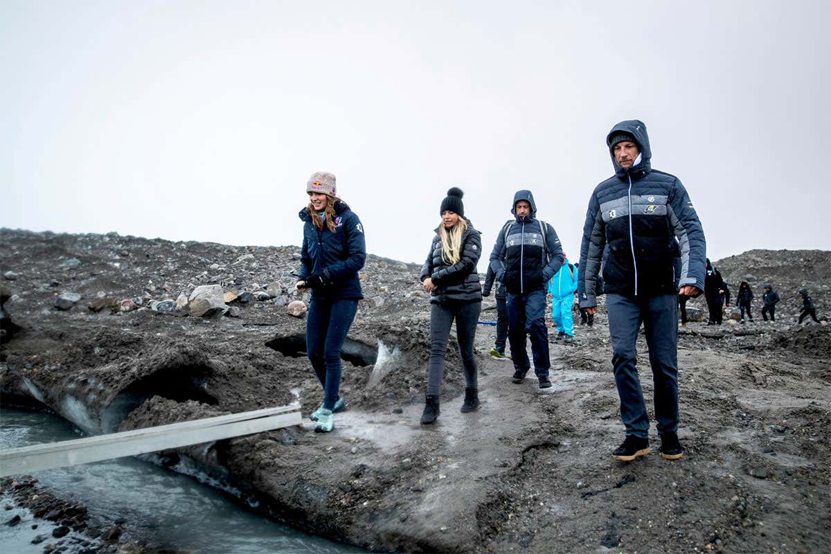 Catie Munnings (GBR), Andretti United Extreme E, Christine 'GZ' Giampaoli Zonca (ESP), Hispano Suiza Xite Energy Team, and Jenson Button (GBR), JBXE Extreme-E Team, on the Russell Glacier