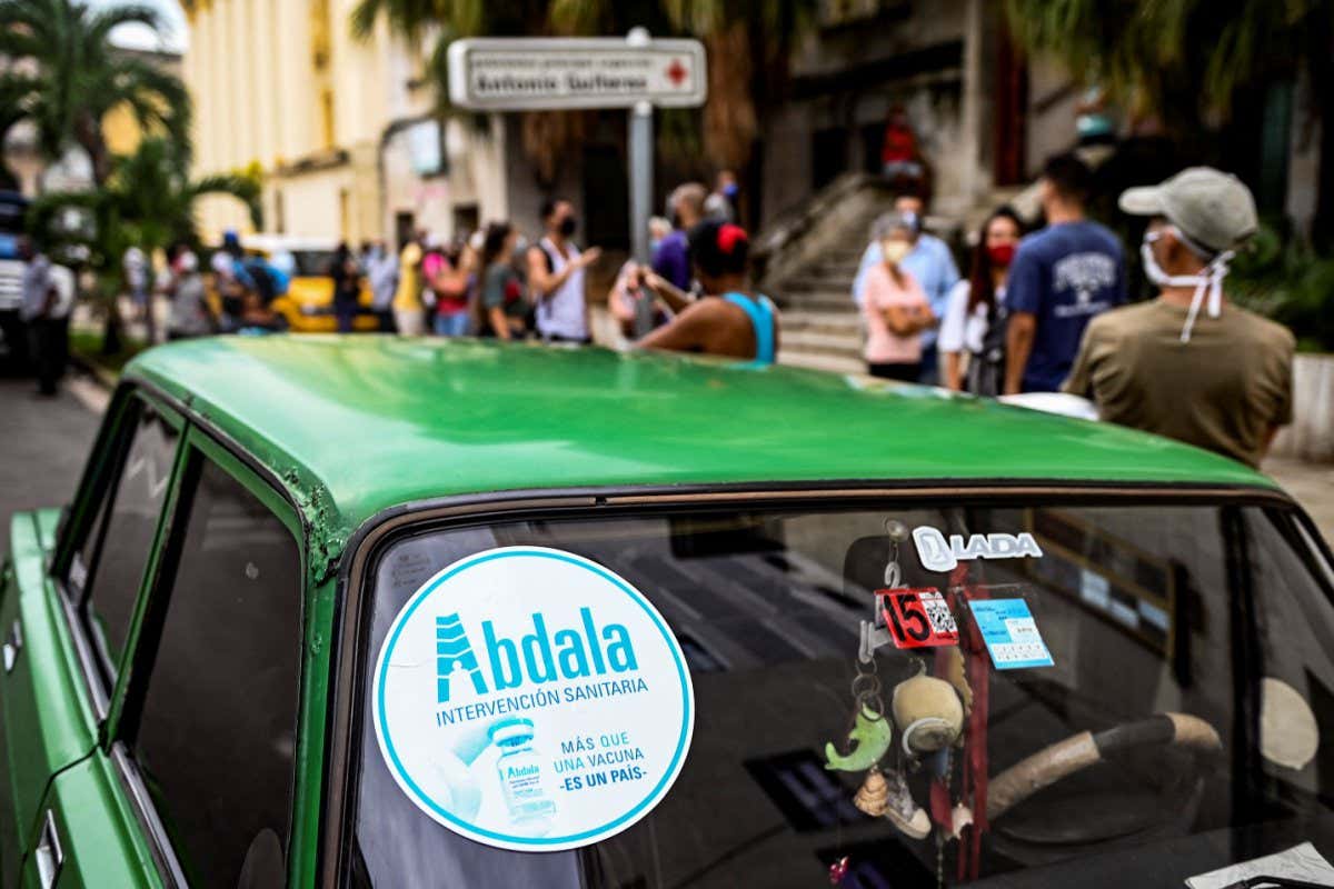 A sign of the Cuban vaccine candidate Abdala against Covid-19 is seen in a car in Havana, on July 1, 2021. - Cuba is preparing to give the green light in a few days to one of its coronavirus vaccines, the first created in Latin America and a hope for the region facing a new wave of the pandemic. (Photo by YAMIL LAGE / AFP) (Photo by YAMIL LAGE/AFP via Getty Images)