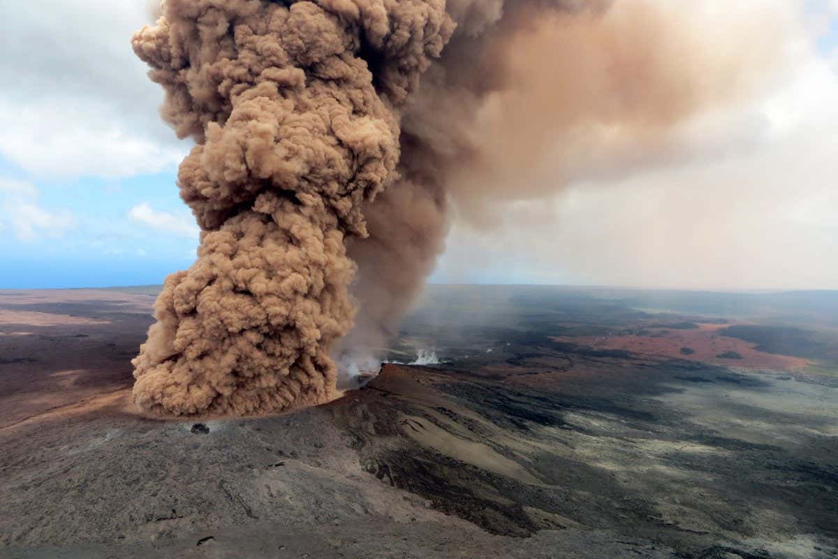 PAHOA, HI - MAY 4: In this handout photo provided by the U.S. Geological Survey, a column of robust, reddish-brown ash plume occurred after a magnitude 6.9 South Flank following the eruption of Hawaii's Kilauea volcano on May 4, 2018 in the Leilani Estates subdivision near Pahoa, Hawaii. The governor of Hawaii has declared a local state of emergency near the Mount Kilauea volcano after it erupted following a 5.0-magnitude earthquake, forcing the evacuation of nearly 1,700 residents. (Photo by U.S. Geological Survey via Getty Images)