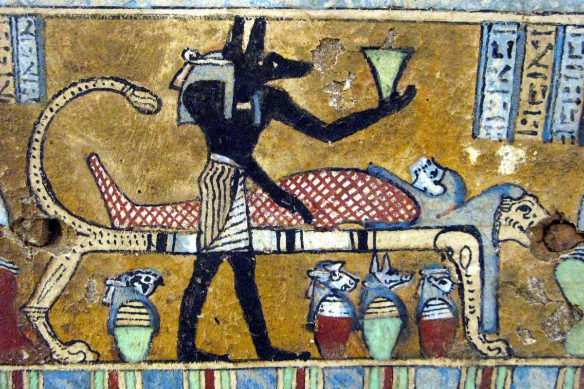 The god Anubis and a mummy