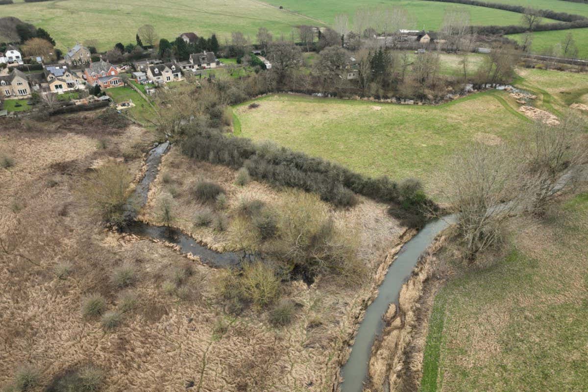 The Evenlode is a 75 kilometre-long river in the Cotswolds, England, plagued with water pollution in recent years. Aerial view of the Evenlode.